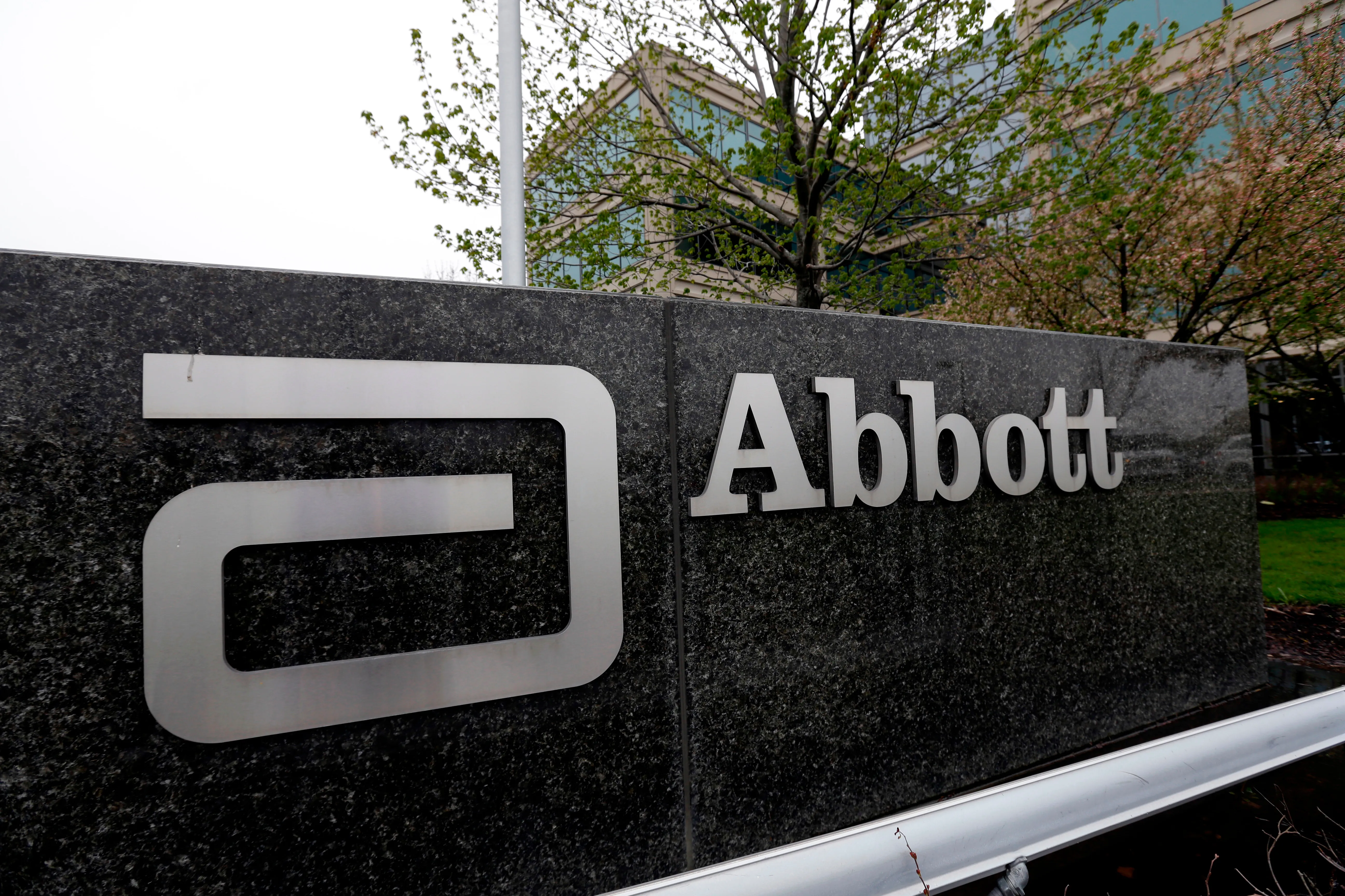 FILE – A sign at an Abbott Laboratories campus facility is displayed, April 28, 2016, in Lake Forest, Ill. A report released on Thursday, June 13, 2024, says the U.S. Food and Drug Administration took more than 15 months to act on a whistleblower complaint it received about conditions at an Abbott Nutrition factory that was at the center of a nationwide shortage of infant formula. (AP Photo/Nam Y. Huh, File)