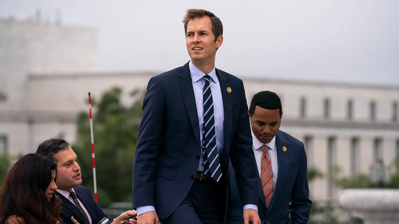 Rep. Jake Auchincloss (D-Mass.) arrives to the House Chamber for the final vote series of the week on Sept. 25, 2024.