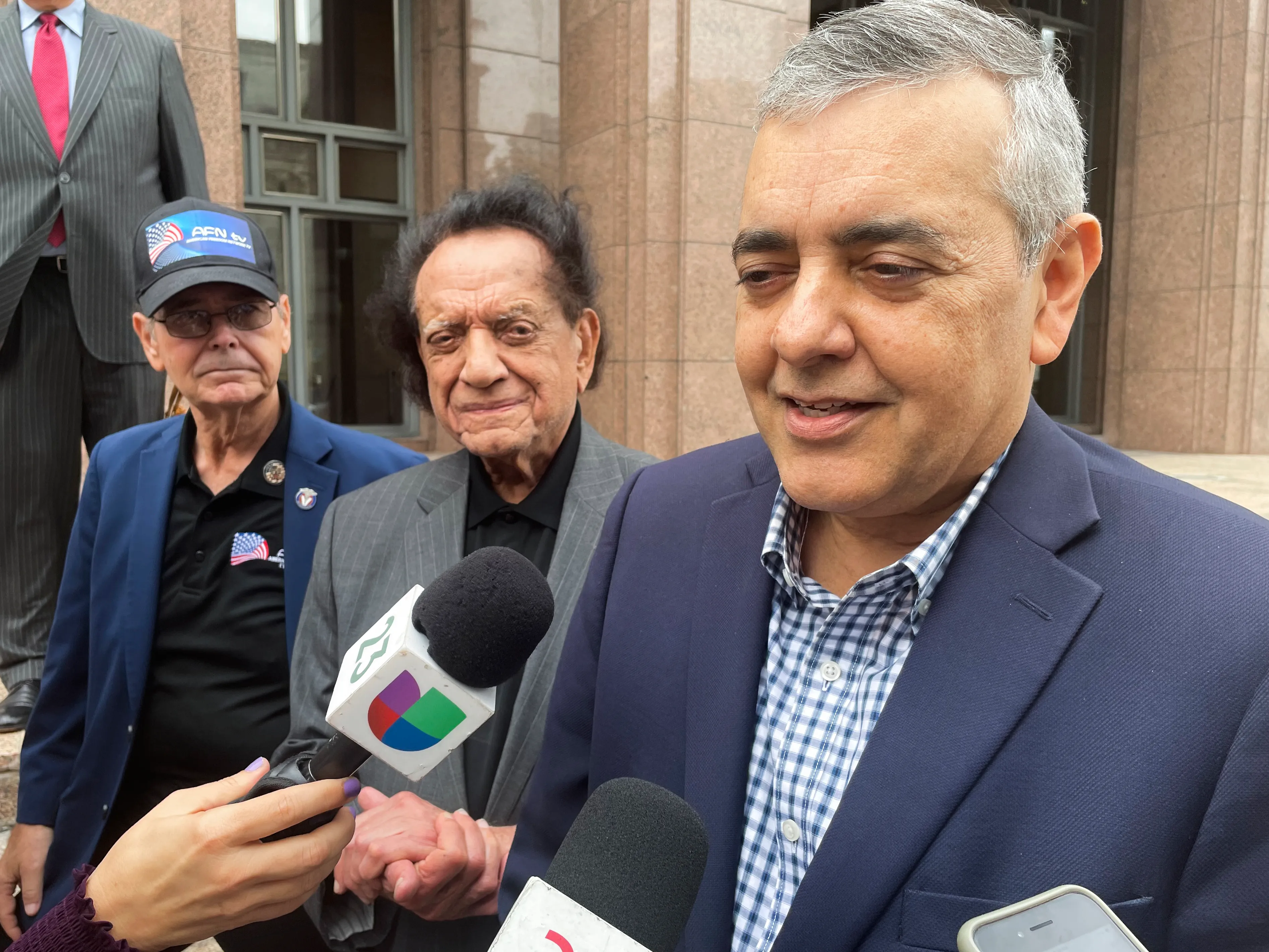 Former Rep. David Rivera (R-Fla.) speaks with media outside Miami federal court, in Miami, Dec. 20, 2022.
