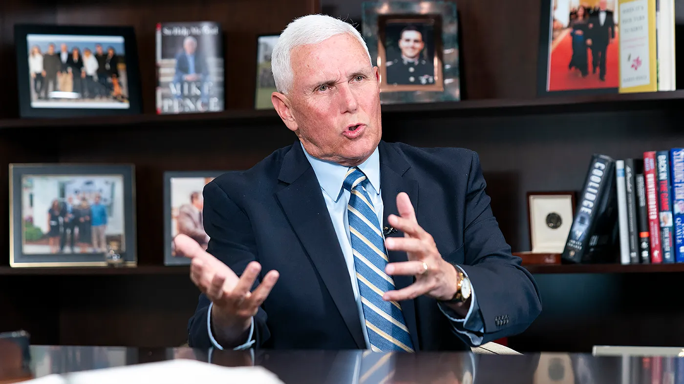 Former Vice President Mike Pence speaks with The Hill’s Brett Samuels in his Washington office on April 9, 2025.