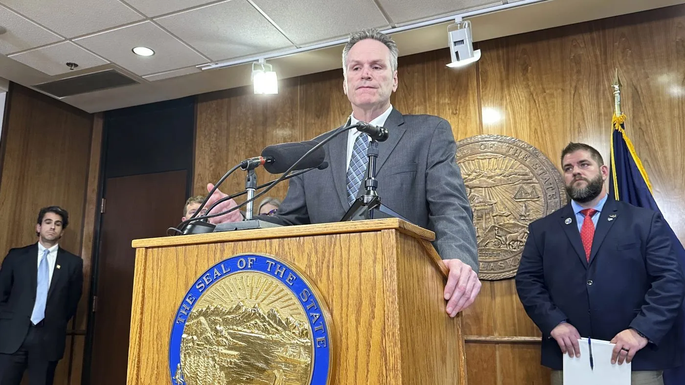 FILE – Alaska Gov. Mike Dunleavy gestures during a news conference, Dec. 12, 2024, in Juneau, Alaska, in which he outlined his budget proposal for the coming year. (AP Photo/Becky Bohrer, File)
