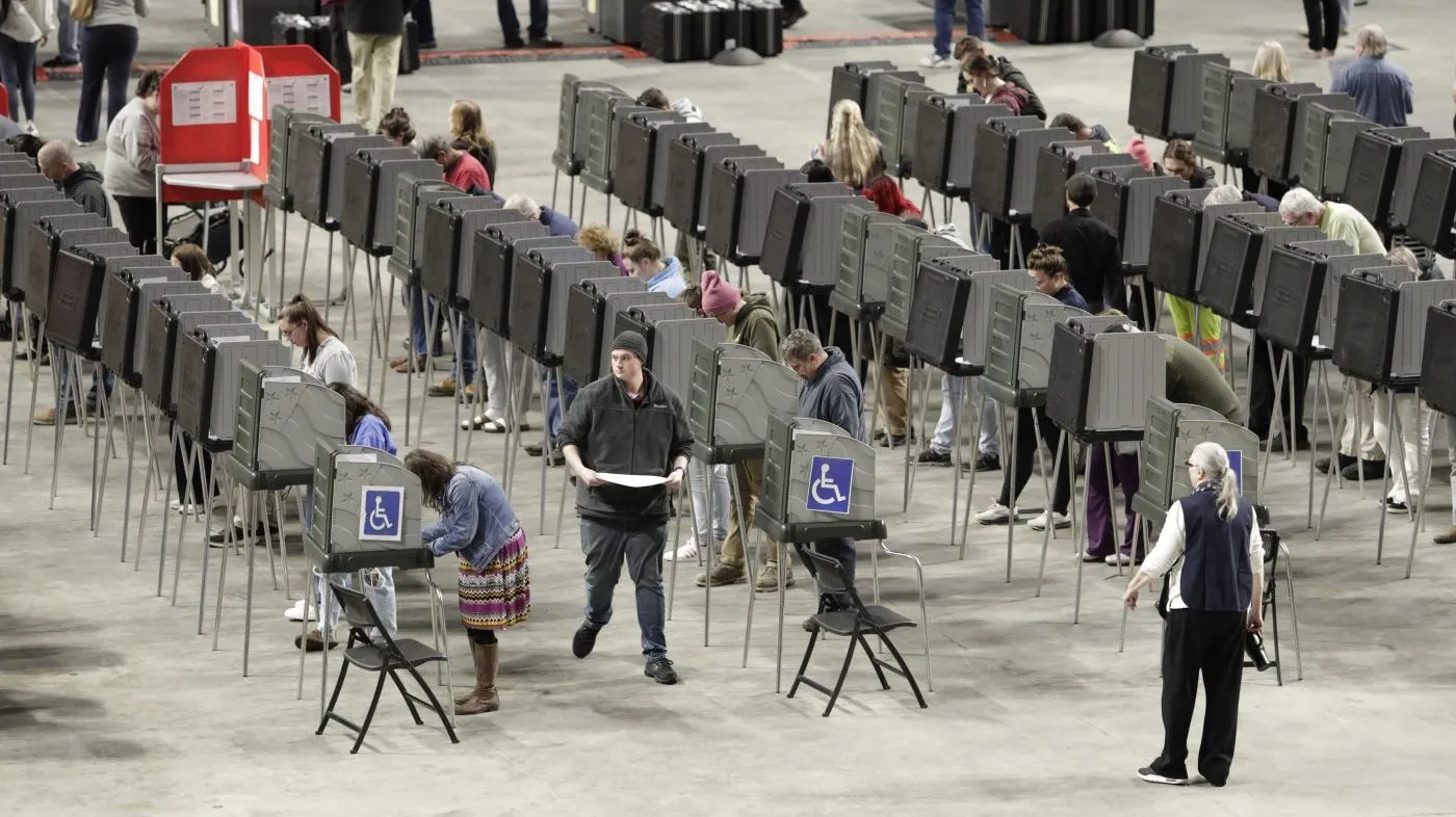 Voters fill out their ballots on Election Day, Nov. 5, 2024, at the Cross Insurance Center in Bangor, Maine.
