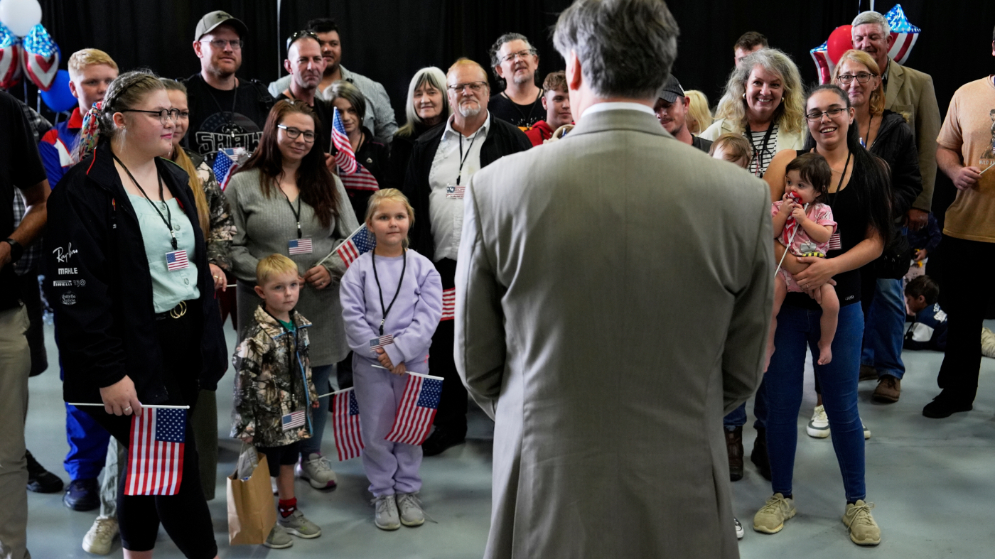 Deputy Secretary of State Christopher Landau greets Afrikaner refugees from South Africa, Monday, May 12, 2025, at Dulles International Airport in Dulles, Va. (AP Photo/Julia Demaree Nikhinson)