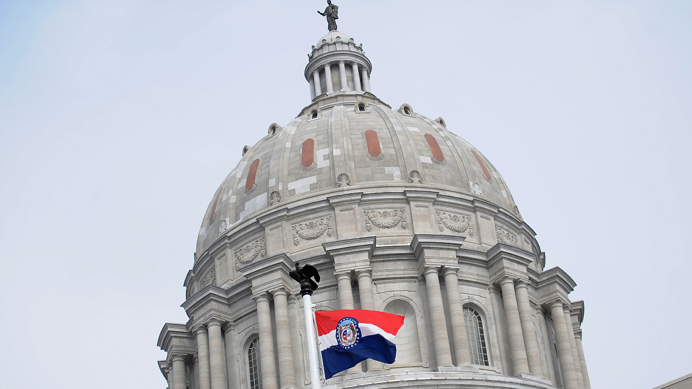 The Missouri state flag is seen flying outside the State Capitol on Jan. 17, 2021, in Jefferson City, Mo.