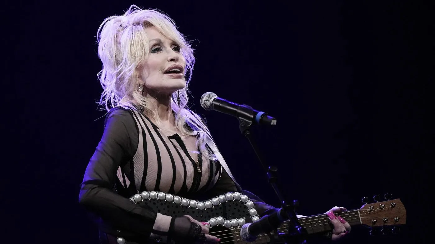 Dolly Parton performs during an event celebrating the expansion of Dolly Parton’s Imagination Library on Aug. 14, 2023, in Overland Park, Kan.