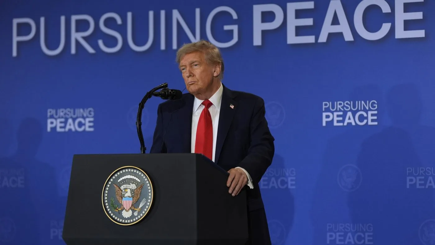 President Trump listens during a news conference with Russian President Vladimir Putin at Joint Base Elmendorf-Richardson, Alaska, on Aug. 15, 2025.