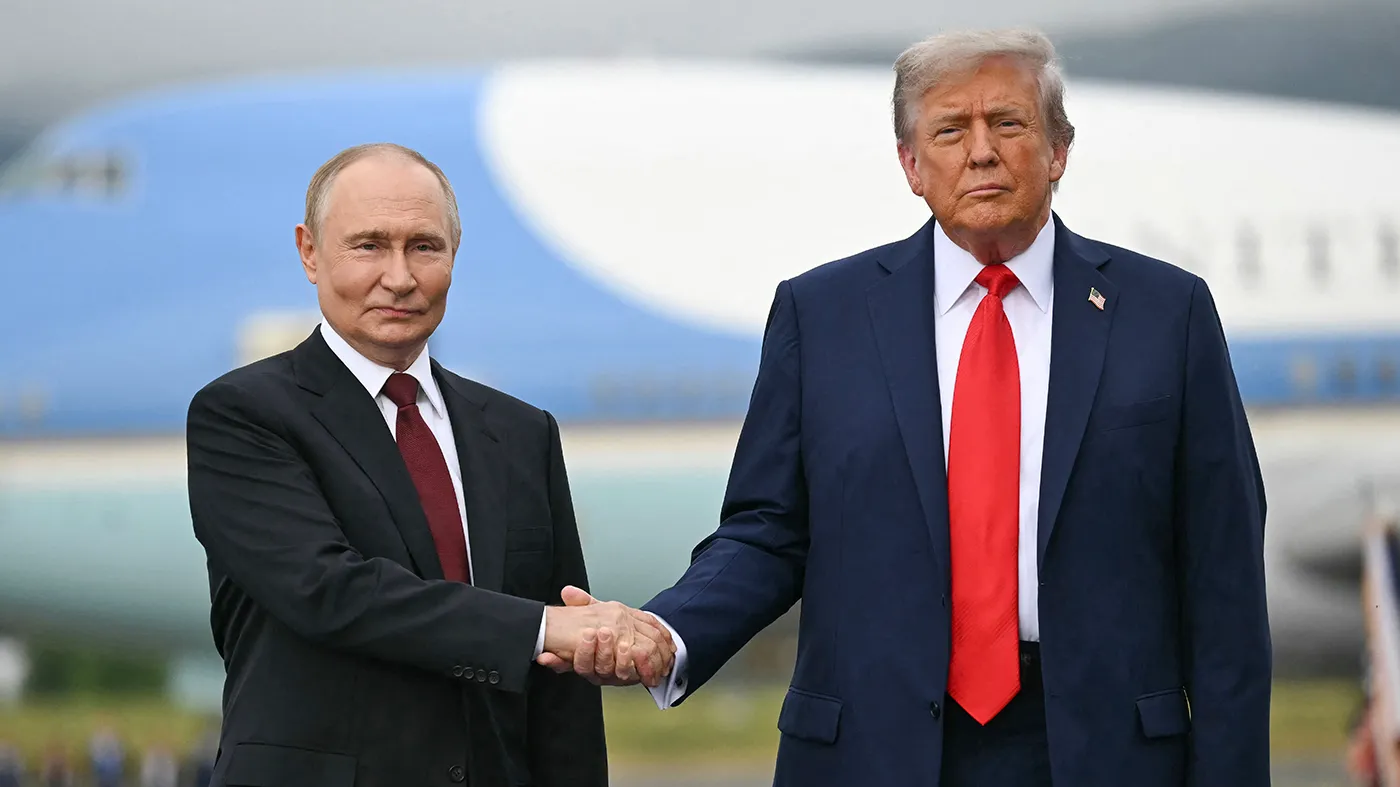 President Trump greets Russian President Vladimir Putin on the tarmac after they arrived at Joint Base Elmendorf-Richardson in Anchorage, Alaska, on August 15, 2025.