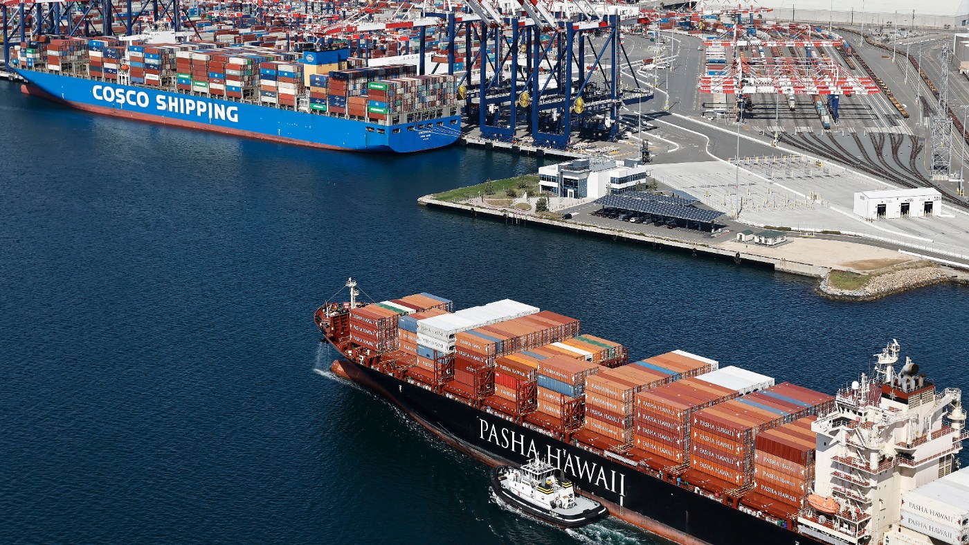 An aerial view of a Pasha Hawaii container ship arriving in the Port of Long Beach near a Cosco Shipping container ship on April 3, 2025, in Long Beach, Calif.