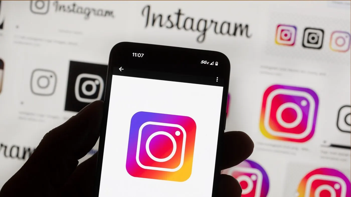 FILE – The Instagram logo is seen on a cell phone in Boston, Oct. 14, 2022. (AP Photo/Michael Dwyer, File)