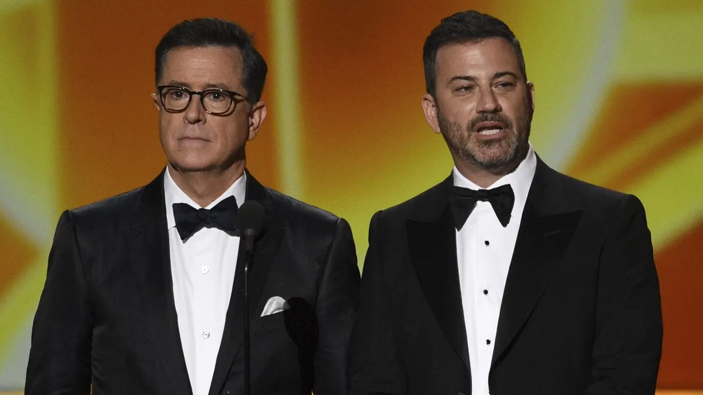 Stephen Colbert, left, and Jimmy Kimmel present the award for outstanding lead actress in a comedy series at the 71st Primetime Emmy Awards, Sept. 22, 2019, at the Microsoft Theater in Los Angeles.