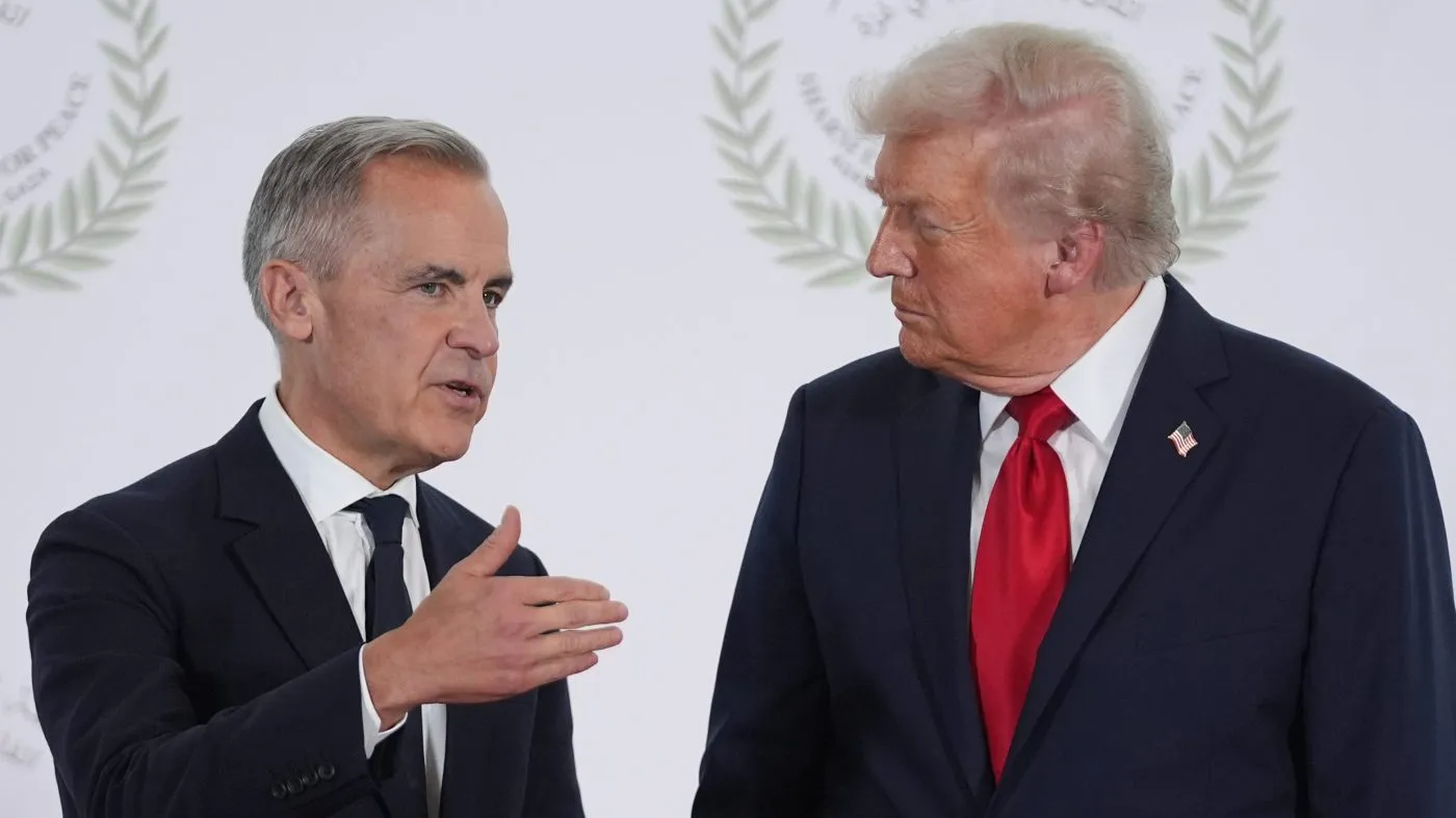 President Trump greets Canadian Prime Minister Mark Carney during a summit to support ending the more than two-year Israel-Hamas war in Gaza after a breakthrough ceasefire deal, Oct. 13, 2025, in Sharm El Sheikh, Egypt.