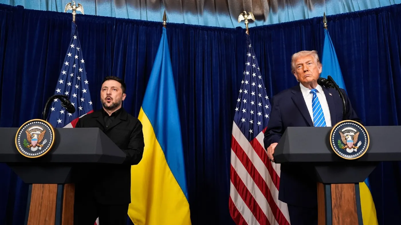 President Trump listens as Ukraine President Volodymyr Zelensky speaks at a joint news conference following a meeting at Trump’s Mar-a-Lago club, Dec. 28, 2025, in Palm Beach, Fla.