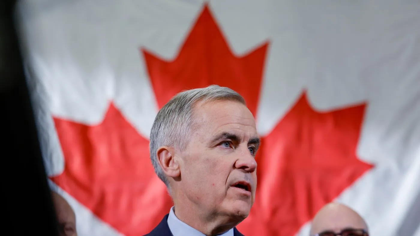 Prime Minister Mark Carney meets with ironworkers in Calgary, Alta., Thursday, Nov. 27, 2025. (Jeff McIntosh /The Canadian Press via AP)