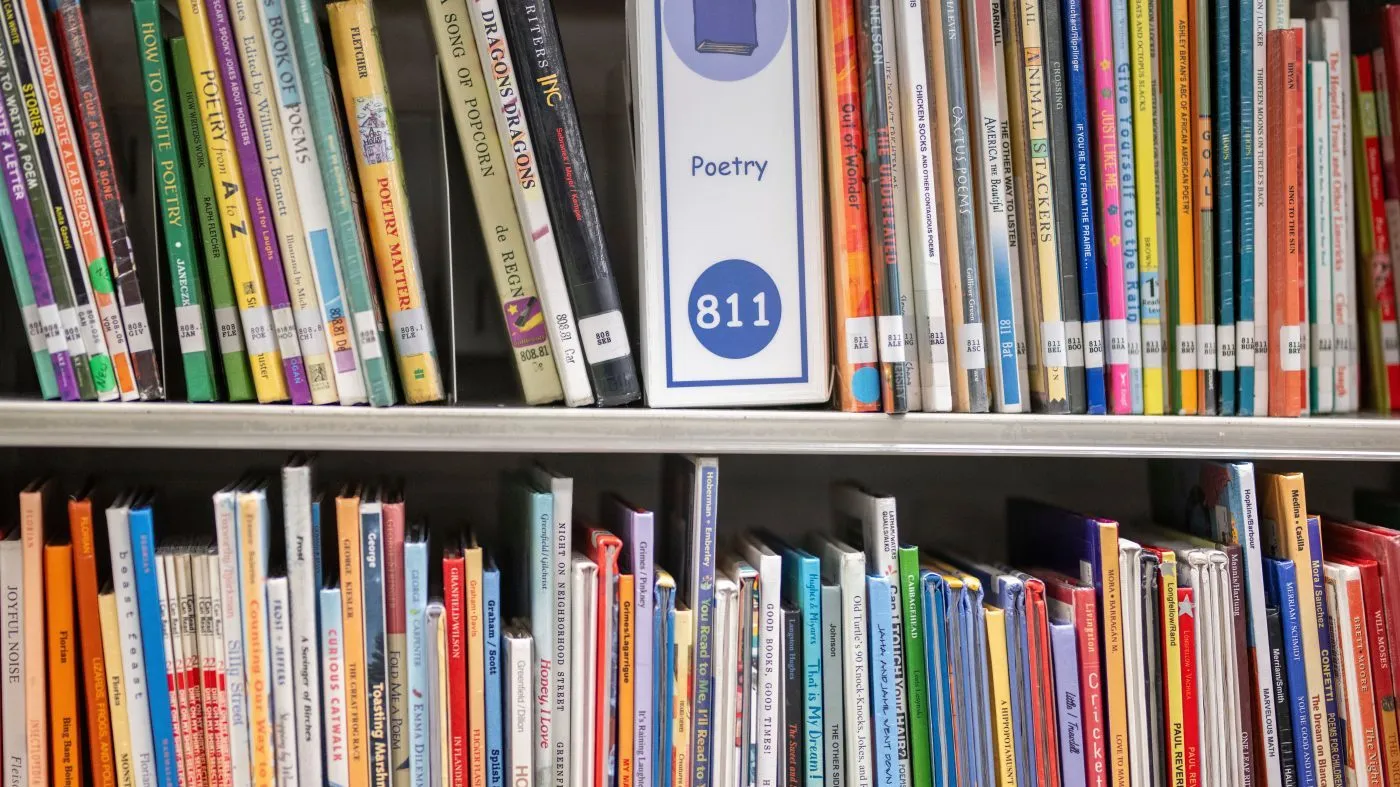 Books sit on shelves in an elementary school library in suburban Atlanta, on Aug. 18, 2023.