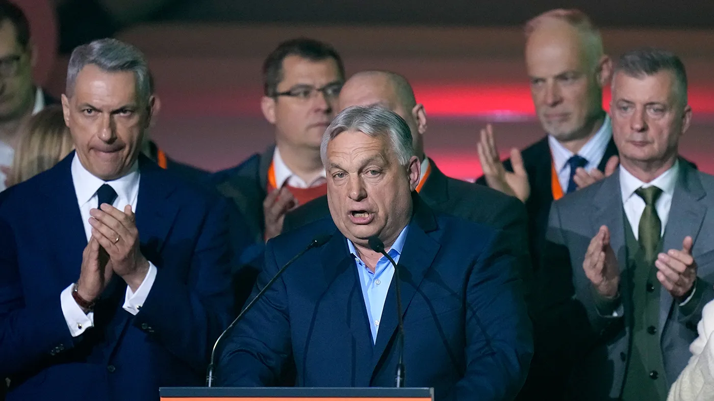 Hungarian Prime Minister Viktor Orbán, center, addresses the media after a parliamentary election in Budapest, Hungary, April 12, 2026.