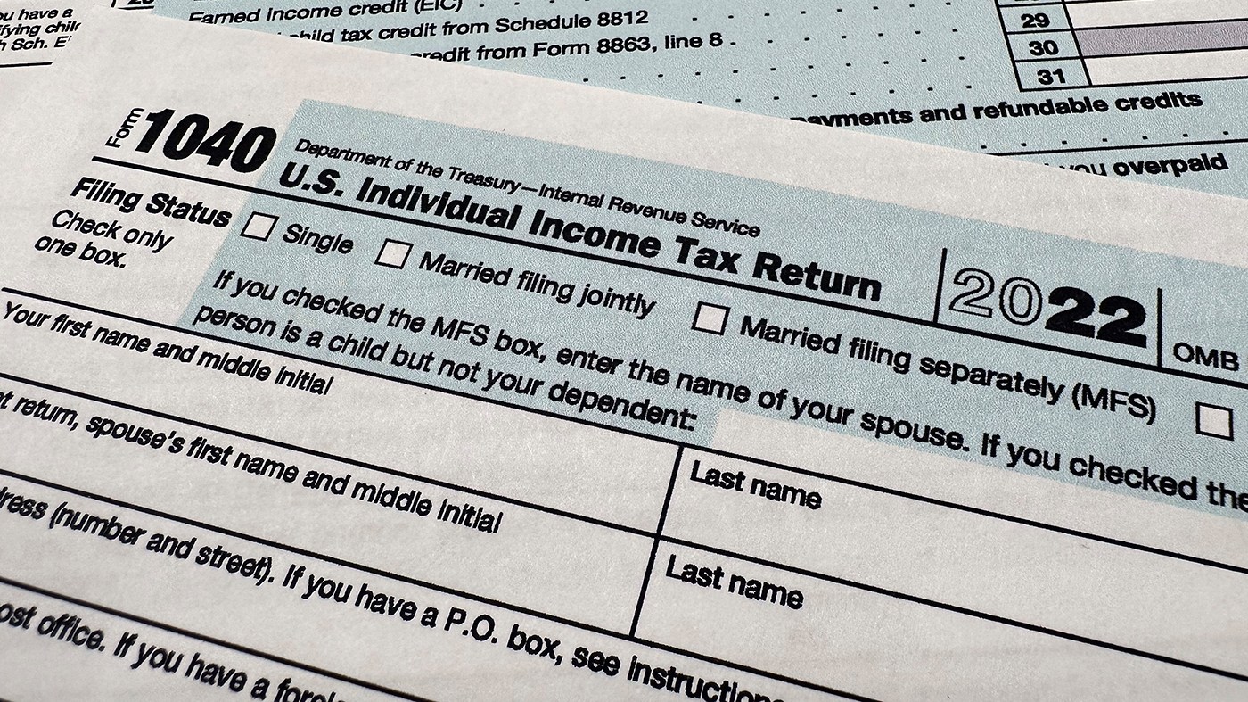 FILE – The Internal Revenue Service 1040 tax form for 2022 is seen on April 17, 2023. The IRS said Friday, April 26, 2024, more than 140,000 taxpayers filed their taxes through its new direct file pilot program. It says the program’s users claimed more than $90 million in refunds, saving roughly $5.6 million in fees they would have spent with commercial tax preparation companies. (AP Photo/Jon Elswick, File)