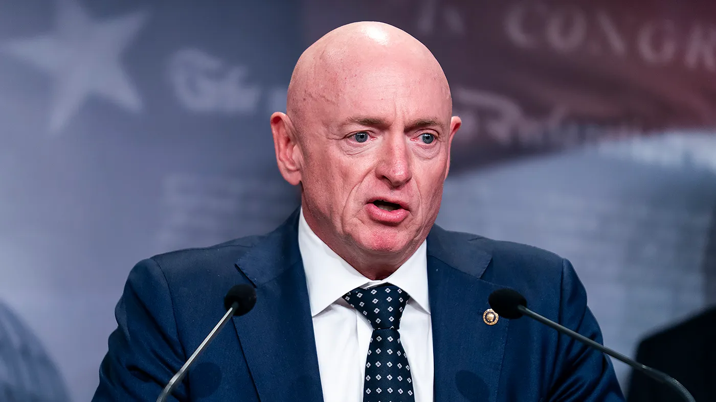 Sen. Mark Kelly (D-Ariz.) speaks during a press conference on April 13, 2026, to discuss an Iran War Powers Resolution as Operation Epic Fury continues on its 44th day.