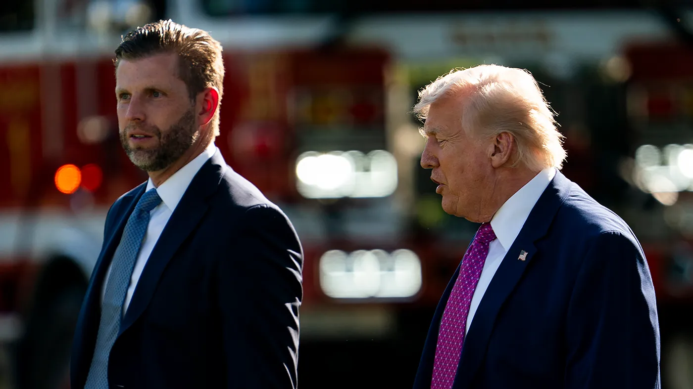 Eric Trump and President Trump head toward Marine One on the South Lawn of the White House in Washington, D.C., on April 10, 2026.