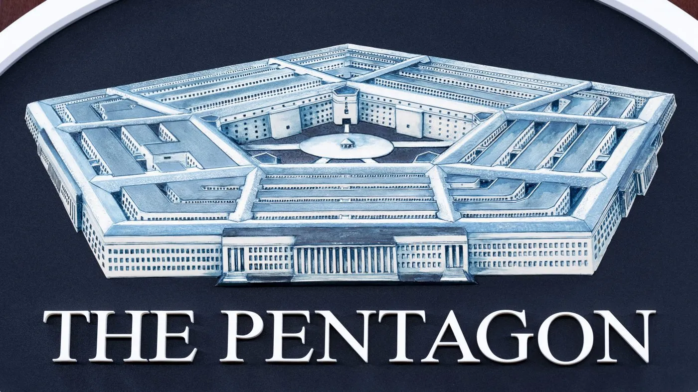 The Department of Defense logo is seen on the wall in the press briefing room at the Pentagon on Oct. 29, 2024 in Washington.