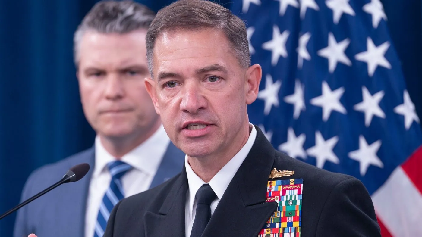 Adm. Brad Cooper speaks to members of the media during a press briefing with Defense Secretary Pete Hegseth, left, at the Pentagon, April 16, 2026, in Washington.