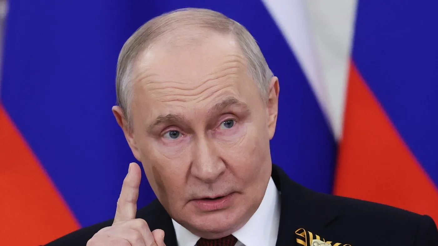 Russian President Vladimir Putin speaks to journalists after a meeting with the heads of foreign delegations on May 9, 2026, at the Grand Kremlin Palace in Moscow.