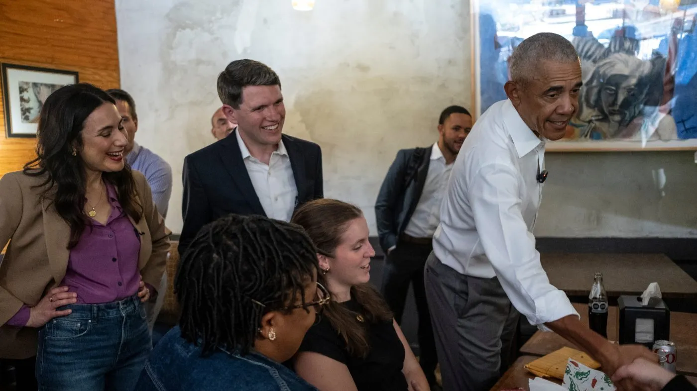 Texas Democratic gubernatorial candidate Gina Hinojosa, Texas Democratic Senate candidate and Texas state Rep. James Talarico, and former President Obama visit the Taco Joint on May 12, 2026, in Austin, Texas.
