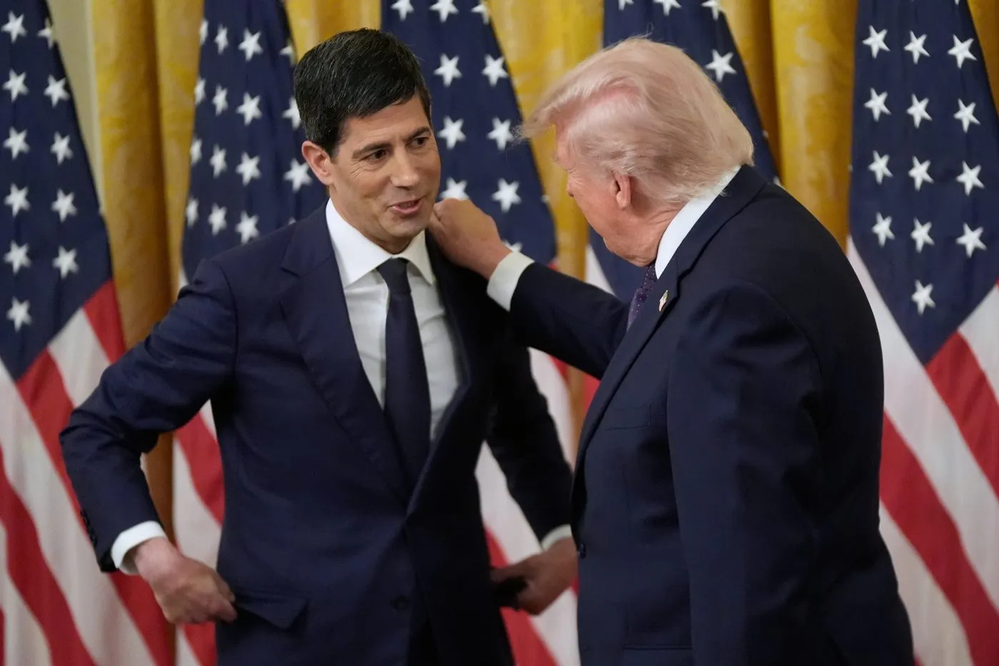 President Donald Trump speaks with Kevin Warsh, after being sworn in as Chairman of the Federal Reserve in the East Room of the White House, Friday, May 22, 2026, in Washington. (AP Photo/Manuel Balce Ceneta)