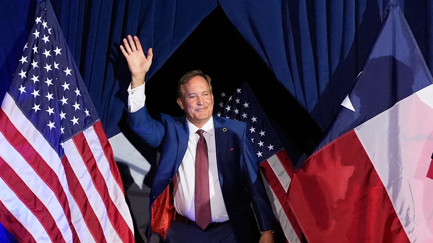 Texas Attorney General Ken Paxton, a Republican candidate for the U.S. Senate, waves as he takes the stage during a primary runoff election night event after winning the Republican party’s nomination May 26, 2026, in Plano, Texas.