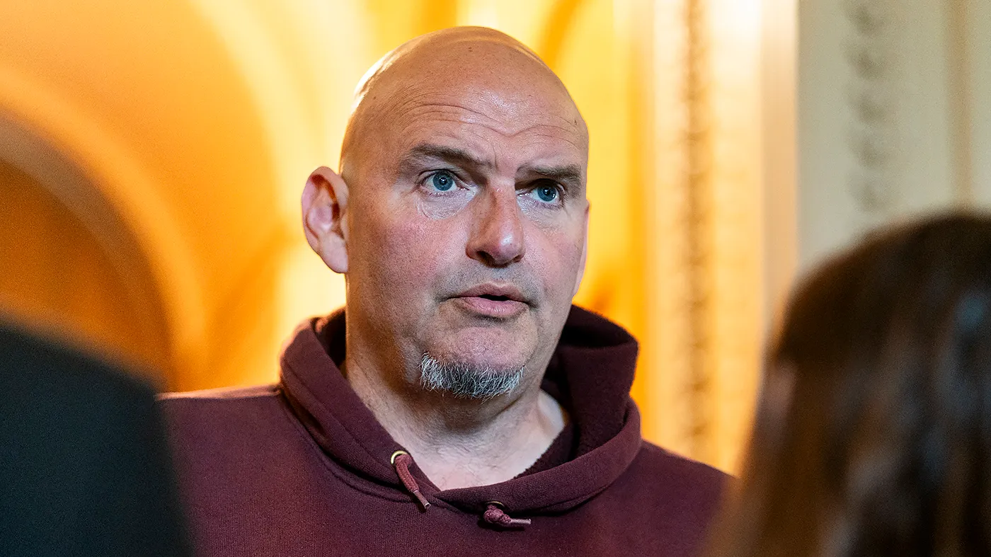 Sen. John Fetterman (D-Pa.) speaks to reporters outside the Senate Chamber following a vote regrading nominations on May 14, 2026.