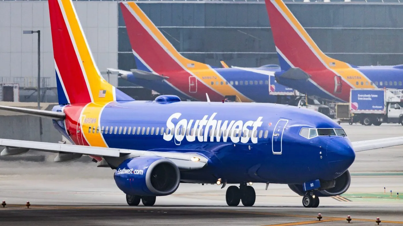 FILE – A Southwest Airlines plane is on the runway at Los Angeles International Airport on March 23, 2026, in Los Angeles. (AP Photo/Ethan Swope, File)