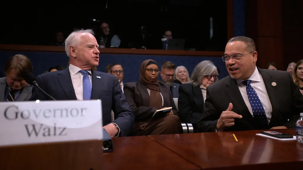 Gov. Tim Walz, D-Minn.,left, and Minnesota Attorney General Keith Ellison, talk before appearing before a House Committee on Oversight and Government Reform hearing on oversight of fraud and misuse of Federal funds in Minnesota, Wed., March 4, 2026, on Capitol Hill in Washington. (AP Photo/Rod Lamkey, Jr.)