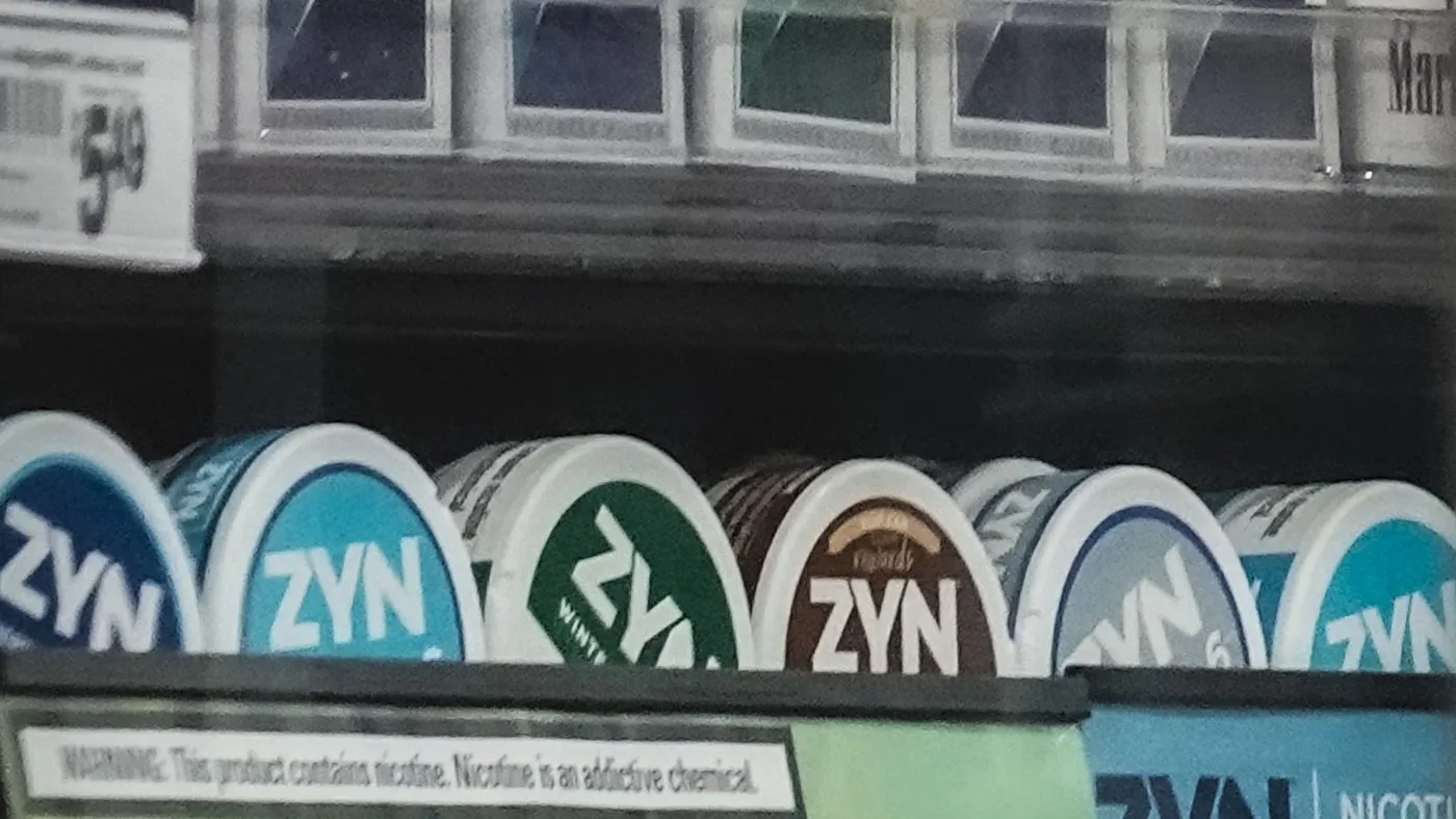 Containers of Zyn, a Phillip Morris smokeless nicotine pouch, are displayed for sale among other nicotine and tobacco products at a newsstand on Feb. 23, 2024, in New York.