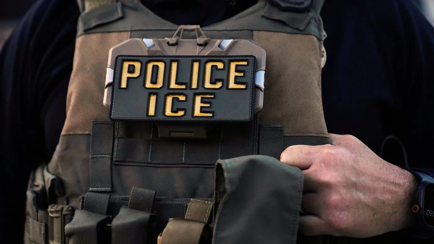 A U.S. Immigration and Customs Enforcement officer is seen in Park Ridge, Ill., Sept. 19, 2025.