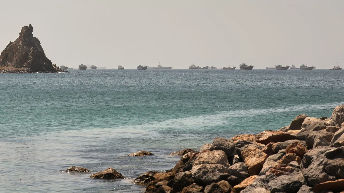 Tankers and cargo vessels are seen in the Gulf of Oman, along shipping routes linking the Strait of Hormuz and the Arabian Sea, June 16, 2026.