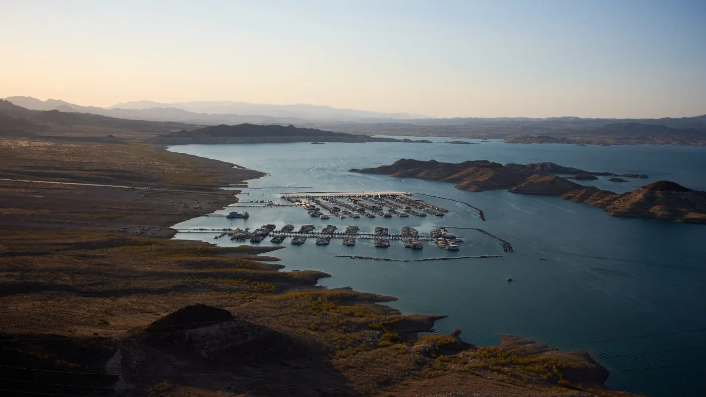 Boats are moored at a marina on Lake Mead amid a drought at the Lake Mead National Recreation Area, Tuesday, June 30, 2026, near Boulder City, Nev. (AP Photo/John Locher)