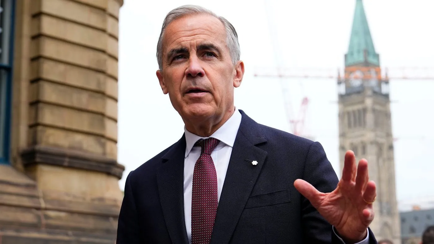 Canada Prime Minister Mark Carney makes a statement outside the Office of the Prime Minister and Privy Council in Ottawa, on Tuesday, July 21, 2026. (Justin Tang/The Canadian Press via AP)