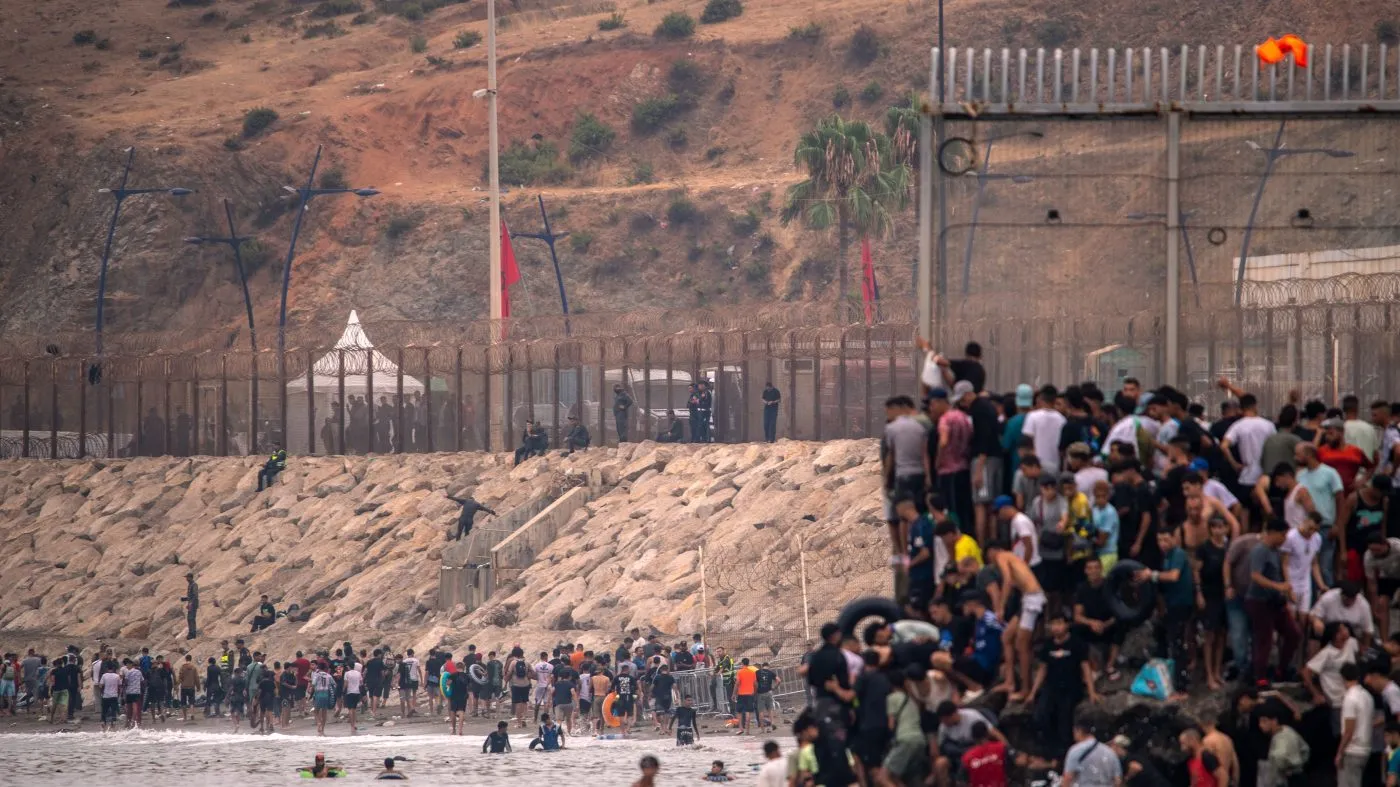 Migrants return to Morocco from the Spanish enclave of Ceuta on July 31, 2026.