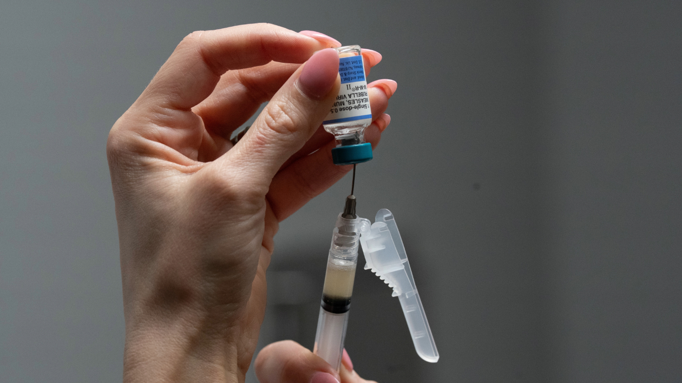 FILE – Lauren Ellenburg, a nurse, prepares a combination measles, mumps and rubella vaccine for a patient at Tiger Pediatrics in Easley, S.C., March 17, 2026. (AP Photo/Mary Conlon, File)
