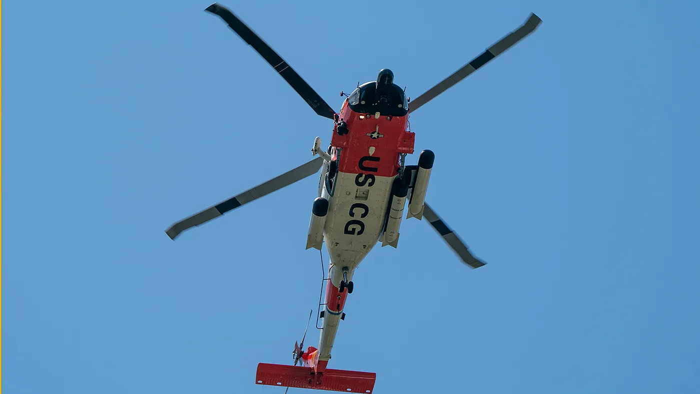 A U.S. Coast Guard helicopter flies over Arlington, Va., as part of the “Freedom 250 Salute to America” event to celebrate America’s 250th birthday on the National Mall in Washington, D.C., on July 4, 2026.