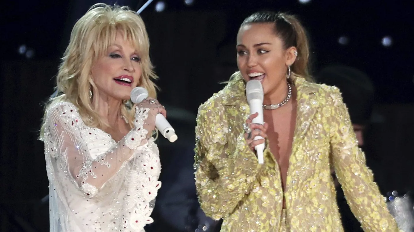 Dolly Parton, left, and Miley Cyrus perform “Jolene” at the 61st annual Grammy Awards in Los Angeles on Feb. 10, 2019.