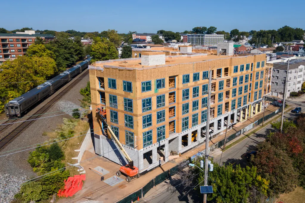 Construction workers build a new rental apartment building in East Rutherford, N.J., on Saturday, October. 4, 2025. (AP Photo/Ted Shaffrey)
