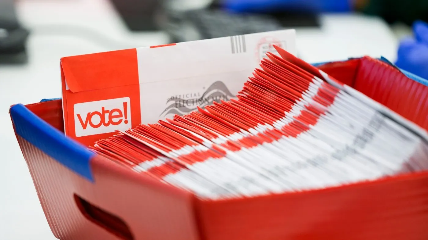 A tray of mail-in ballots is seen at King County Elections headquarters on Election Day, Nov. 5, 2024, in Renton, Wash.
