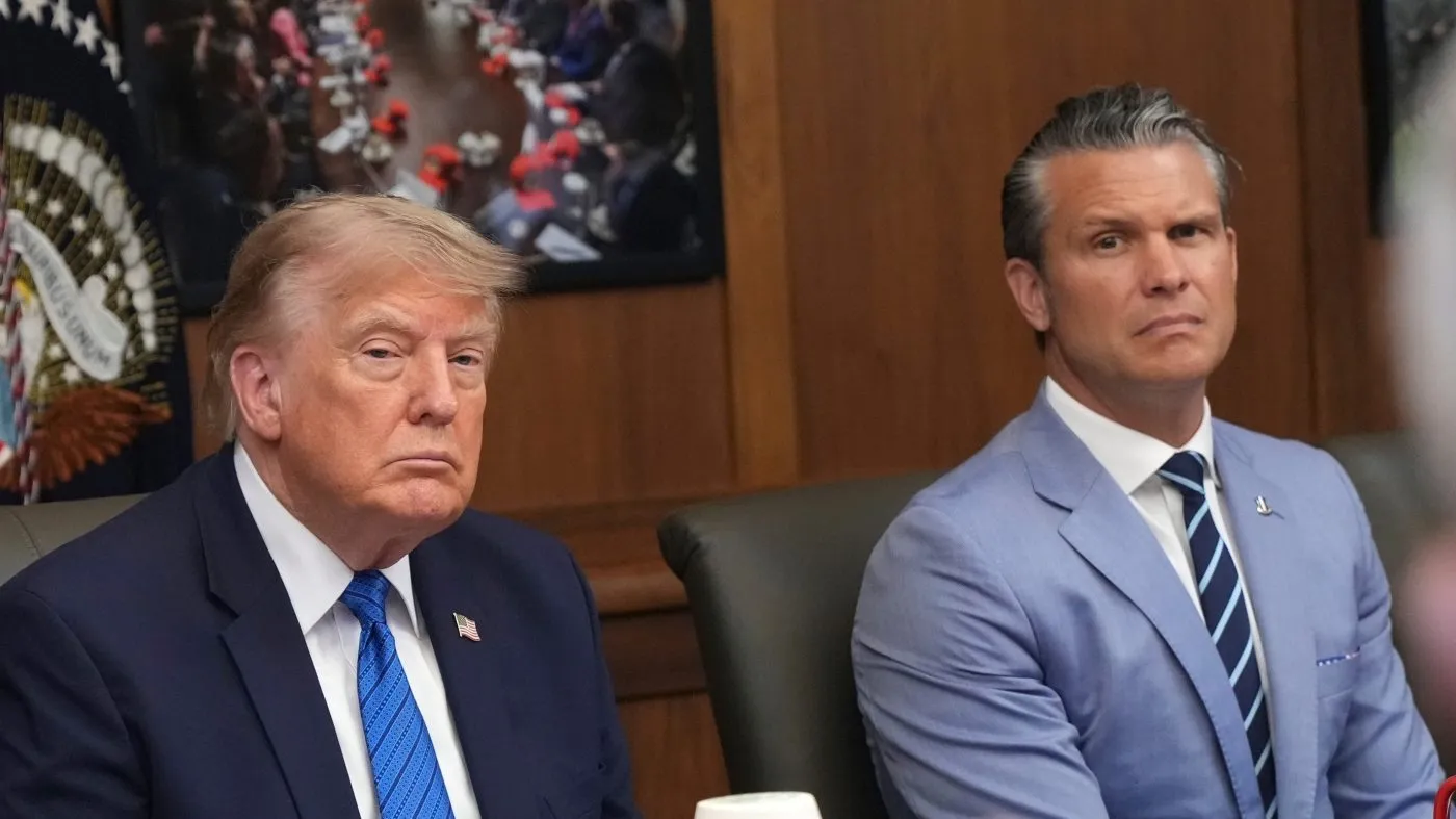 President Trump and Defense Secretary Pete Hegseth listen during a Cabinet meeting, July 31, 2026, at Camp David, the presidential retreat, near Thurmont, Md.