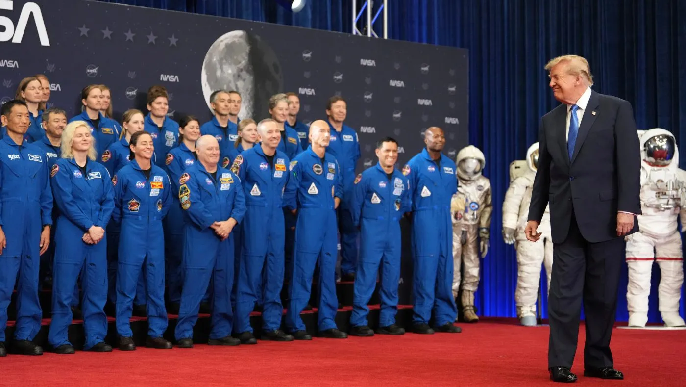 President Trump looks to astronauts as he arrives to present the Congressional Space Medal of Honor to Artemis II crew members, Aug. 28, 2026, at Johnson Space Center in Houston.
