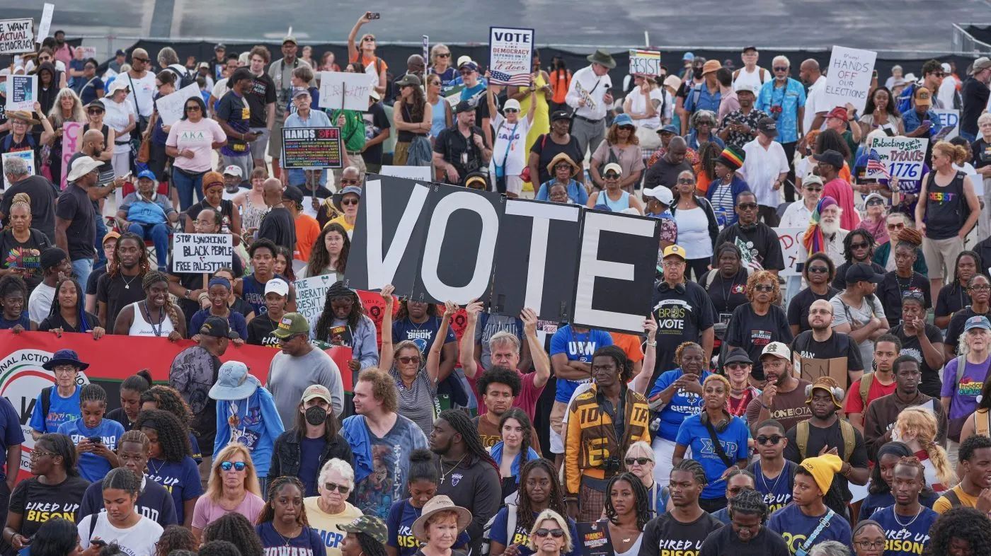 Demonstrators listen to speakers during the March on Washington, near the Lincoln Memorial, Aug. 28, 2026, in Washington.