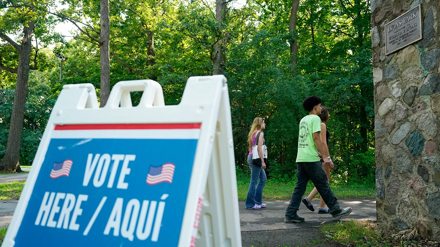 Voters arrive to cast their ballots at Lyons Park on primary election day, Aug. 11, 2026, in Milwaukee.
