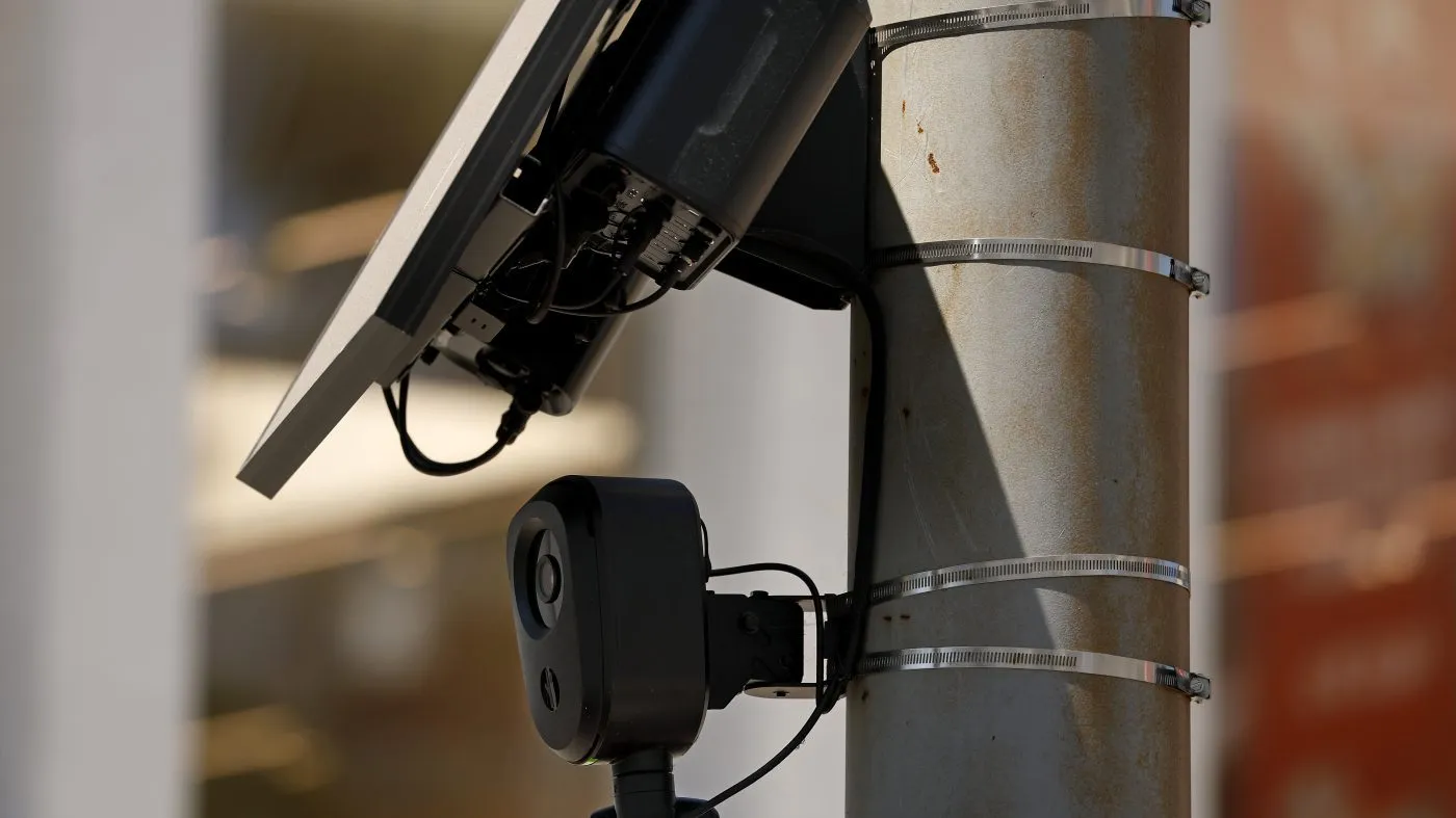 BEVERLY HILLS, CALIFORNIA – AUGUST 03: A Flock Safety camera is shown mounted to a light pole on August 03, 2026 in Beverly Hills, California. Flock Safety’s automated license plate reader cameras have been deployed in over 120,000 locations across 49 states, using artificial intelligence to identify vehicles by their license plates, make, model and color to help law enforcement investigate crimes, while also drawing criticism from privacy advocates over concerns about mass surveillance and the collection of motorists’ location data. (Photo by Justin Sullivan/Getty Images)