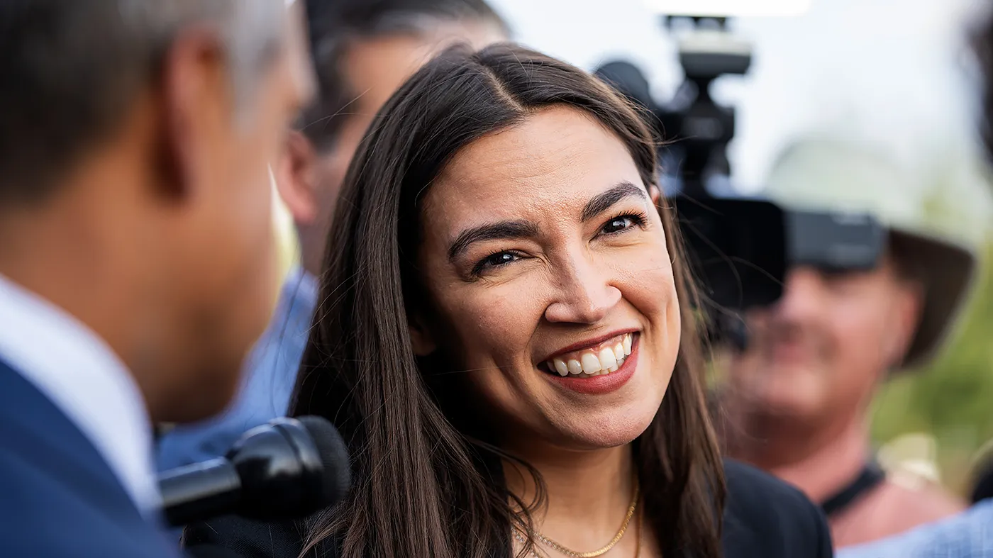 Rep. Alexandria Ocasio-Cortez (D-N.Y.) speaks to reporters after leaving the U.S. Capitol after the House’s last votes for the day in Washington, D.C., on Wednesday, July 22, 2026.