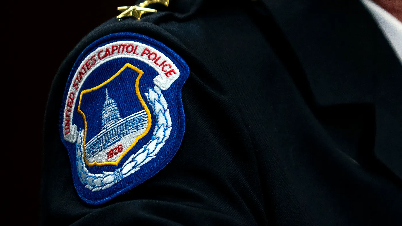 A U.S. Capitol Police patch is seen on Chief Michael Sullivan during a House Appropriations subcommittee budget hearing for the department on March 17, 2026.