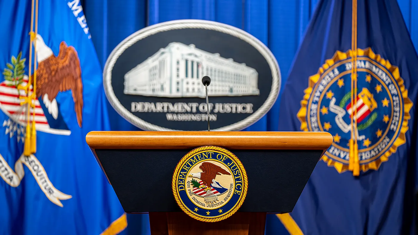 The Department of Justice podium sits empty before a press conference to announce law enforcement actions against the Jalisco New Generation Cartel at the Department of Justice in Washington, D.C., on Aug. 5, 2026.